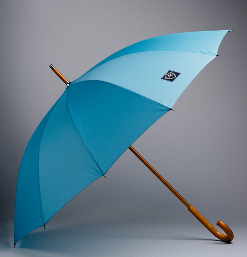 Light blue umbrella with a wooden handle and wooden stick