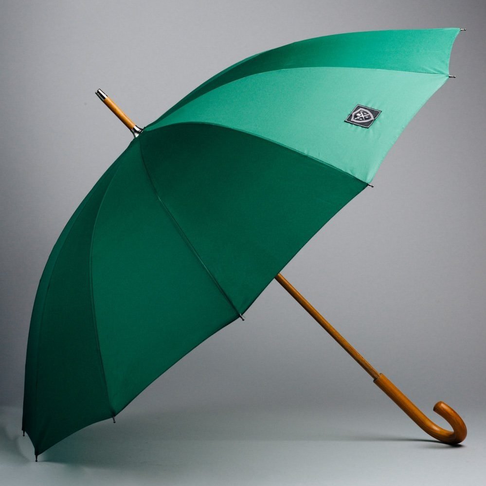 large green umbrella with wooden hook handle