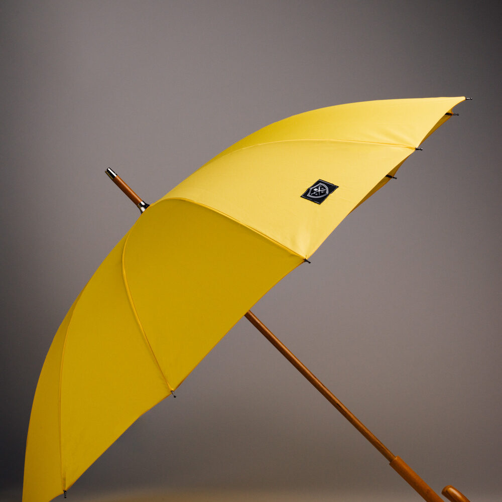 Classic Yellow umbrella with a wooden stick